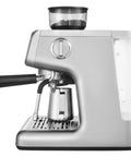 Semi Automatic Espresso Machine With Built In Conical Burr Grinder, 30 Precision Grind Settings, 15 Bar Pump Pressure, side view with silver finish.