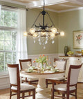 Dining room with Wagon Wheel Chandelier 9 Light Black Farmhouse Industrial Metal Pendant Light With Crystal Accents