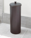 Freestanding Bronze Toilet Paper Holder With Lid For Three Extra Rolls Slim Modern Bathroom Storage Stand That Keeps Spare Rolls Neatly Hidden Under A Decorative Knob