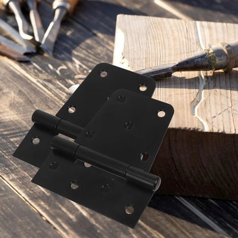 Heavy Duty Built Tough Three Point Five Inch Black Weld On Gate Hinges 2 Pack on wooden surface with tools