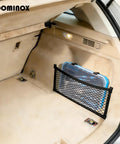 25 Piece General Household Tool Set With Plastic Storage Toolbox placed in car trunk's net storage.