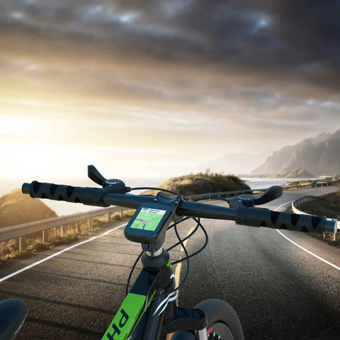 Bicycle with GPS device on road at sunrise, showcasing Gear Up With This 4 Pack Bike Mount Replacement Inserts for Out Front Cycling