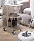 Universal 4 Piece Furniture Leg Set With Swivel Plate And Silent Rolling Wheels Adjustable Height For Easy Cleanups next to mop