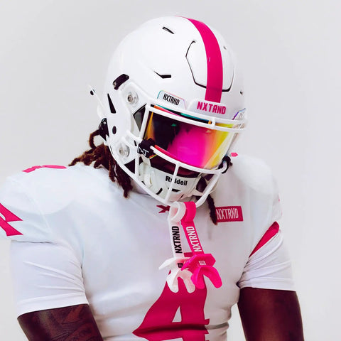 Game Day Ready Dope Football Mouth Guard With Permanent Strap For Adults And Youth Pink helmet and face shield gear.