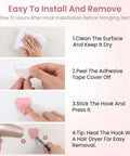 Instructions for Super Sweet Pink Heart Wall Hooks 10 Pack Adhesive Hangars for installation and removal steps.