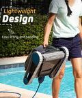 Person holding Nautilus CC Automatic Robotic Pool Cleaner With Wall Climbing Scrubber, showcasing lightweight design by pool