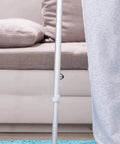 C Shape Tube Lock Clips For Walking Sticks And Crutches, Rock Solid Secure Clamp Design shown on a grey walking stick.
