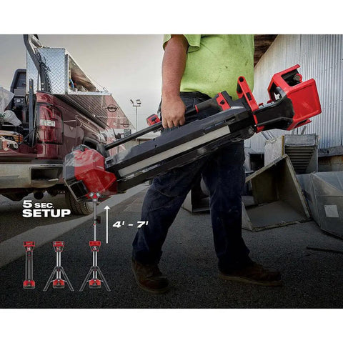 Heavy Duty Tower Light With Built In Charger For Job Sites 6000 Lumen TrueView Lighting being carried at a job site