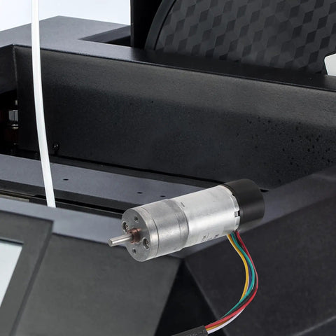 Top Shelf High Torque Metal Dc Micro Motor With Encoder mounted on equipment, showing metal casing and wiring.