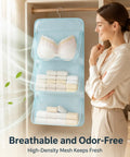 Pink Mesh Storage Hanging Bag With 360 Swivel Hook and Expandable Double Layer Closet Organizer holding bras and towels.