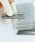 Close-up of 6pc abrasive water jet nozzle focusing tubes, stainless steel, Amazon brand in plastic storage case