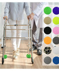Person using walker with 12 Pack Precut Tennis Ball Glides for Walkers Easy Slip On Felt Pad Covers visible on legs