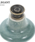 Close-up of vintage floral pattern sky blue porcelain drawer pull from Six Piece Retro Ceramic Cabinet Knob Set.