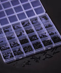 1440 Piece Black Micro Screw Assortment Kit For Laptops And Gaming Rigs With M1 2 M1 4 M1 7 And M2 Phillips Flat Countersunk fasteners in clear organizer box.