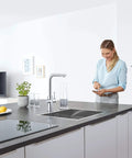 Clean Lines Single Handle Pull Out Kitchen Faucet With Laminar Spray Led Knobs For Chilled Sparkling Water Butter Smooth Pour 180 Swivel Spout real game changing kitchen upgrade in modern kitchen setting.