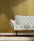 Top Tier Weathered Stripe Gold Metallic Wallpaper For Dope Indoor Walls Featuring Hella Stylish Fibrous Texture and Paste The Wall Application With Eco Friendly Pvc Free Class A Rated Finish That Adds Serious Swag To Any Room Setup applied to a stylish room with a cream sofa.