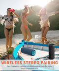 Wireless Portable Speaker With 25W Bangin Bass And Bassboom Technology IPX7 Waterproof Bluetooth Speaker TWS Pairing Built In Mic 16 Hour Playtime With Lights For Home And Outdoor Fun on beach with people dancing