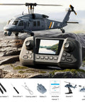 Military Style RC Helicopter With 8K Camera And Built In Screen Remote displaying accessories and controller on rocky terrain.