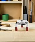 Built Tough Stainless Steel Smoke Transducer Disassembly Tool For Easy As Pie Sensor Swaps And Rock Solid Fire Safety Upkeep Featuring Corrosion Resistant Heads, viewed on a workbench.