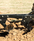 Three Point 21 Inch Double Moldboard Turn Plow for Category 1 Tractors in field, turning soil and breaking residue.