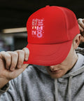 Person wearing Cool Red Trucker Hat For Men With Adjustable Buckle The Sport Style Cap Built For Running Hiking Cycling And Everyday Wear