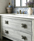 Level Up Your Home Decor With These Hella Durable Antique Bronze Cabinet Knobs And Drawer Pulls Featuring Rustic Industrial Style Corrosion Resistant Finish And Included Screws on gray vanity.