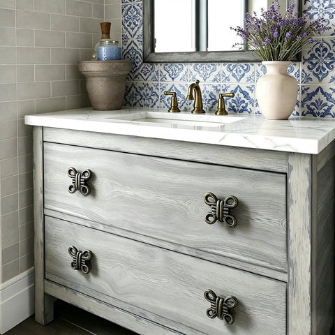 Level Up Your Home Decor With These Hella Durable Antique Bronze Cabinet Knobs And Drawer Pulls Featuring Rustic Industrial Style Corrosion Resistant Finish And Included Screws on gray vanity.