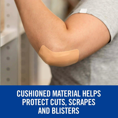 Person with waterproof cushioned foam bandage on elbow, protective adhesive dressing for cuts, scrapes, blisters, water exposure.