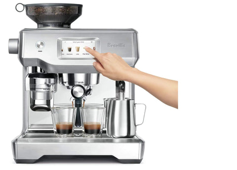 Heavy Duty Fully Automatic Espresso Machine With Slick Touchscreen Interface and Pro Grade Dual Boiler Rig For Killer Specialty Coffee At Home Featuring Precise Thermal Regulation And Smooth Simultaneous Brewing, hand selecting drink.