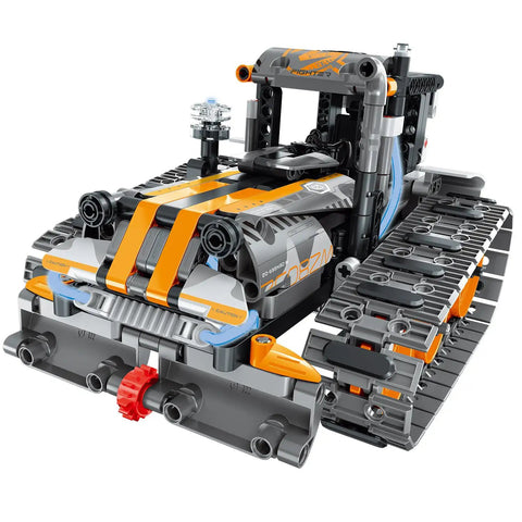 5 In 1 STEM Building Set With LED Lights And App Remote Control Toy Kit 554 Pieces To Build Robots Tanks Snowplows Cannons And More RC Car Racer And Sleigh Tracks For Kids Ages 6 7 8 9 10 11 12 And Up snowplow model with tracks and orange details.
