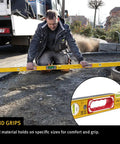 Heavy Duty Digital Spirit Level 9 Inch Torpedo Gauge With Dual Illuminated Lcd Displays IP67 Waterproof Dustproof Rugged Tool Built Tough For The Daily Construction Hustle And Dead Nuts Precision in use on construction site.