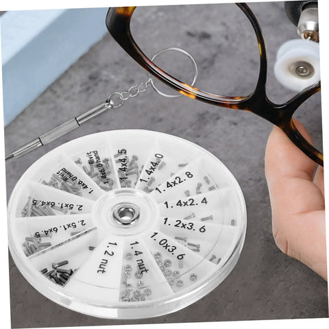 Portable Eyeglass Repair Kit With Mini Screwdriver And Compact Storage Box For Quick Fixes Of Glasses Sunglasses And Watches On The Go Easy To Use Highly Organized Grab And Go Travel Repair Kit showing components and screwdriver