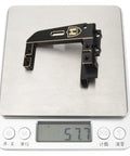 Brass Servo Mount Upgrade For Vanquish H10 Optic Sparco Yokohama 1 To 10 RC Crawler on scale showing 57.7 grams
