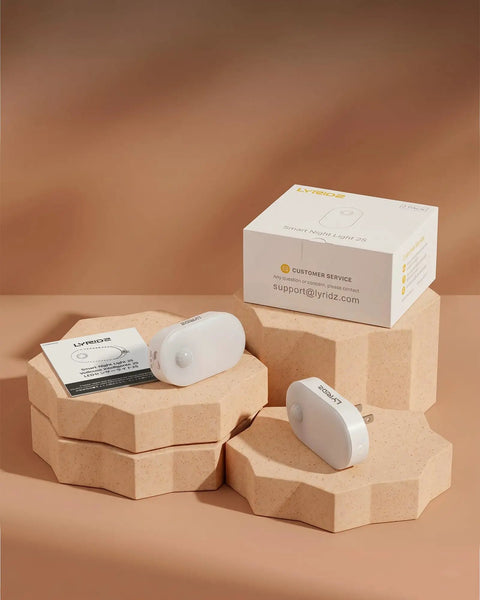 Plug In Night Light With Motion Sensor, Stepless Brightness From 1 To 120 Lumens, set of 4 on geometric cardboard stand with packaging.
