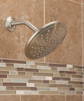 8 Inch Brushed Nickel Rain Showerhead Fixed Round Wide Rain Shower Head With 2.5 GPM Flow Easy Install On 1/2 Inch IPS Arm Single Function Shower For Modern Bathrooms, mounted on tiled wall.