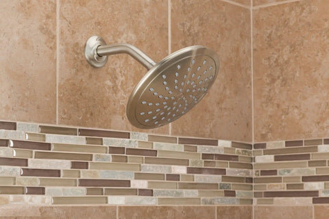 8 Inch Brushed Nickel Rain Showerhead Fixed Round Wide Rain Shower Head With 2.5 GPM Flow Easy Install On 1/2 Inch IPS Arm Single Function Shower For Modern Bathrooms, mounted on tiled wall.