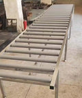 Set Of 5 Plastic Conveyor Belt Rollers For Tough Jobs, Powerless Replacement Units In 4 6 8 10 12 14 16 18 22 24 28 31 35 39 Inch Length, Blue, With 20mm 25mm 32mm 40mm 50mm 63mm Diameters, Customizable Feed Table Rollers on a metal conveyor frame