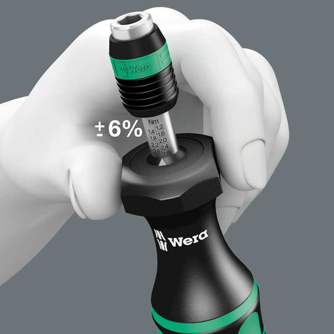 User adjusting torque on Kraftform Compact 60 Torque Screwdriver Set With Adjustable 1.2-3 Nm, Rapidaptor quick-release displayed