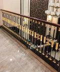 Top Tier Adjustable Aluminum Balusters For Indoor Stairs And Decks With Heavy Duty Metal Spindles in gold and black finish.
