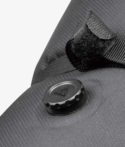 Close-up of waterproof material and air release button on Frontloader 8 Liter Bar Bag for Bike Handlebar Mount.