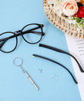 Hella Sturdy Universal Glasses Arm Replacement Kit For Sweet Eyeglasses Legs Swap Including Screws Washers Nose Pads And Mini Screwdriver For A Dang Fast Frame Rescue Any Day with black eyeglasses and replacement arms.