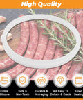 Universal Sausage Stuffer Gasket Replacement O Ring Seal For Vertical And Horizontal 3 5 7 L Sausage Makers Fits Most Brands Replacement Plunger Gasket Part displayed on a wooden table with garlic and sausages.