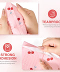 Close-up of hands sealing a cherry pink bubble mailer showing tearproof and strong adhesion features for shipping.