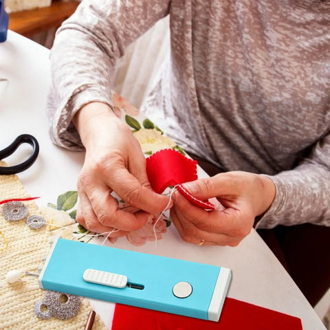 Automatic Needle Threader With Seam Unpicker For Home Sewing Machines Easy Threading Tool For Beginners And Novices No-Fuss Quick Threading Smooth Sewing Sessions Makes Needle Changes Fast And Simple., blue plastic automatic needle threader on sewing table