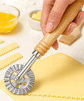 Hand using Multipurpose Dough Roller And Pastry Wheel Cutter For Pizza Round Blade Pizza Cutter Pro Grade Dope Easy Grip Gadget