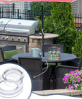 Durable PVC Patio Table Umbrella Hole Ring Plug for Outdoor Dining Tables in garden setting with grill and table setup.