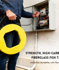 Heavy Duty 164 Foot Fiberglass Fish Tape Cable Puller Kit Featuring A Spring Drum Reel And Non Conductive Core That Routes Electrical Wire No Sweat Through Conduit in use near electrical panel.