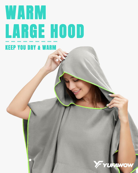 Person wearing a gray Hooded Towel Changing Poncho for Surfing and Outdoor Adventures on the Go Privacy Robe with front kangaroo pocket.