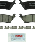 Bosch BC1602 QuietCast ceramic rear brake pad set for Ford F-150, includes four pads, hardware clips, and lubricant.
