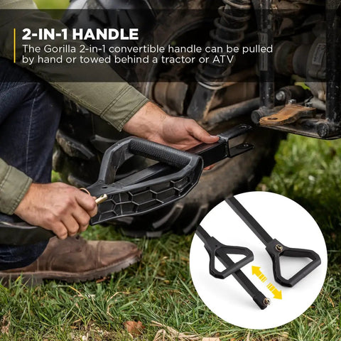 Close-up of a person attaching the handle of the Heavy-Duty Steel Utility Cart with 4 cu ft bed and 900 lb load capacity to a vehicle.